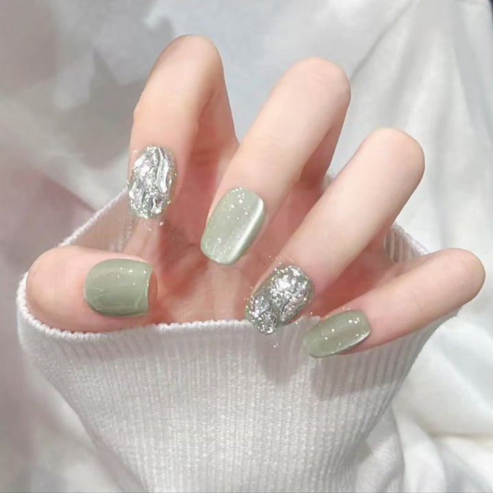 Acrylic nail set with elegant glitter design and creative effects Bowlift