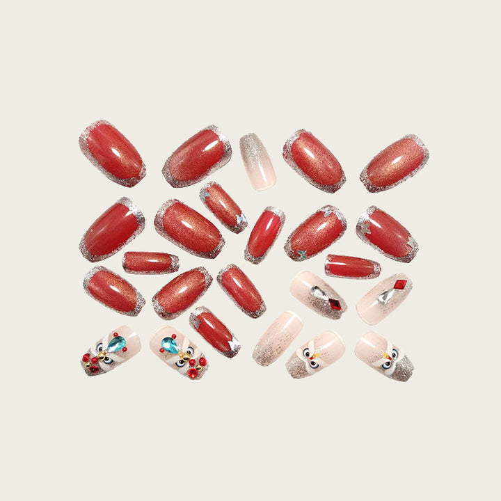 Artificial nails with glitter and gemstone applications Bowlift