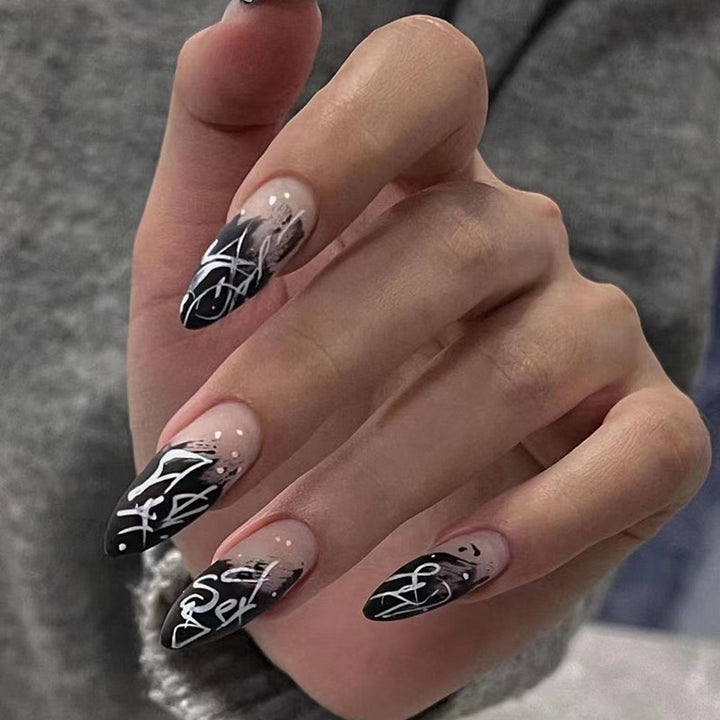 Artistic Stiletto Press-On Nails with Abstract Design Bowlift