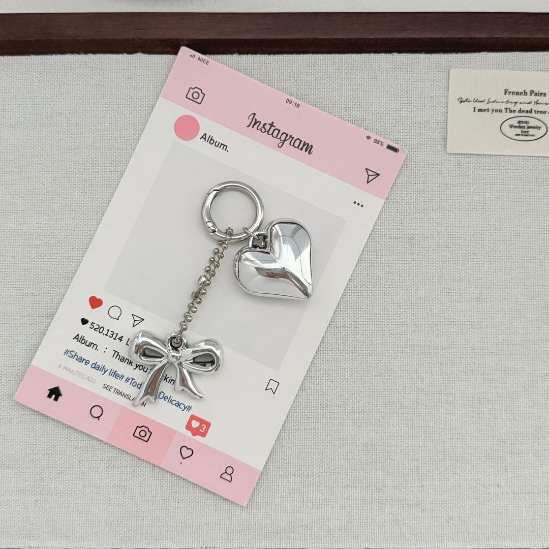 Heart-Shaped Charm Keychain with Bow Bowlift