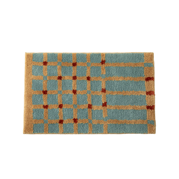 Soft runner bath mat with geometric checkered pattern and non-slip underside Bowlift