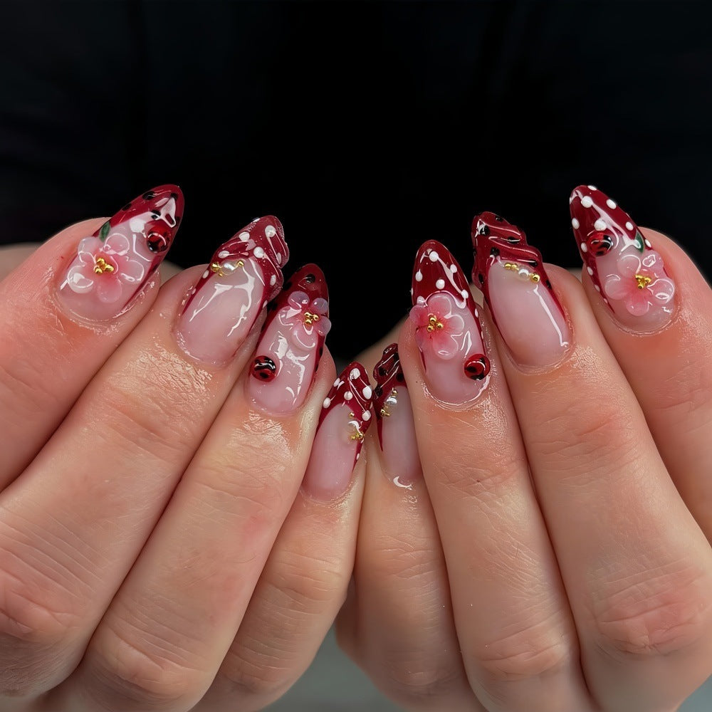 Creative tip design artificial nails with floral accents Bowlift