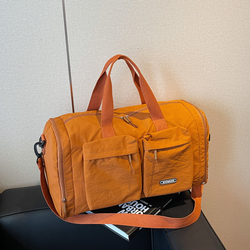 Sporty Travel Bag With Several Exterior Pockets Bowlift
