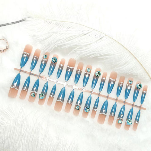 Artificial nails with elegant glitter and stone details Bowlift
