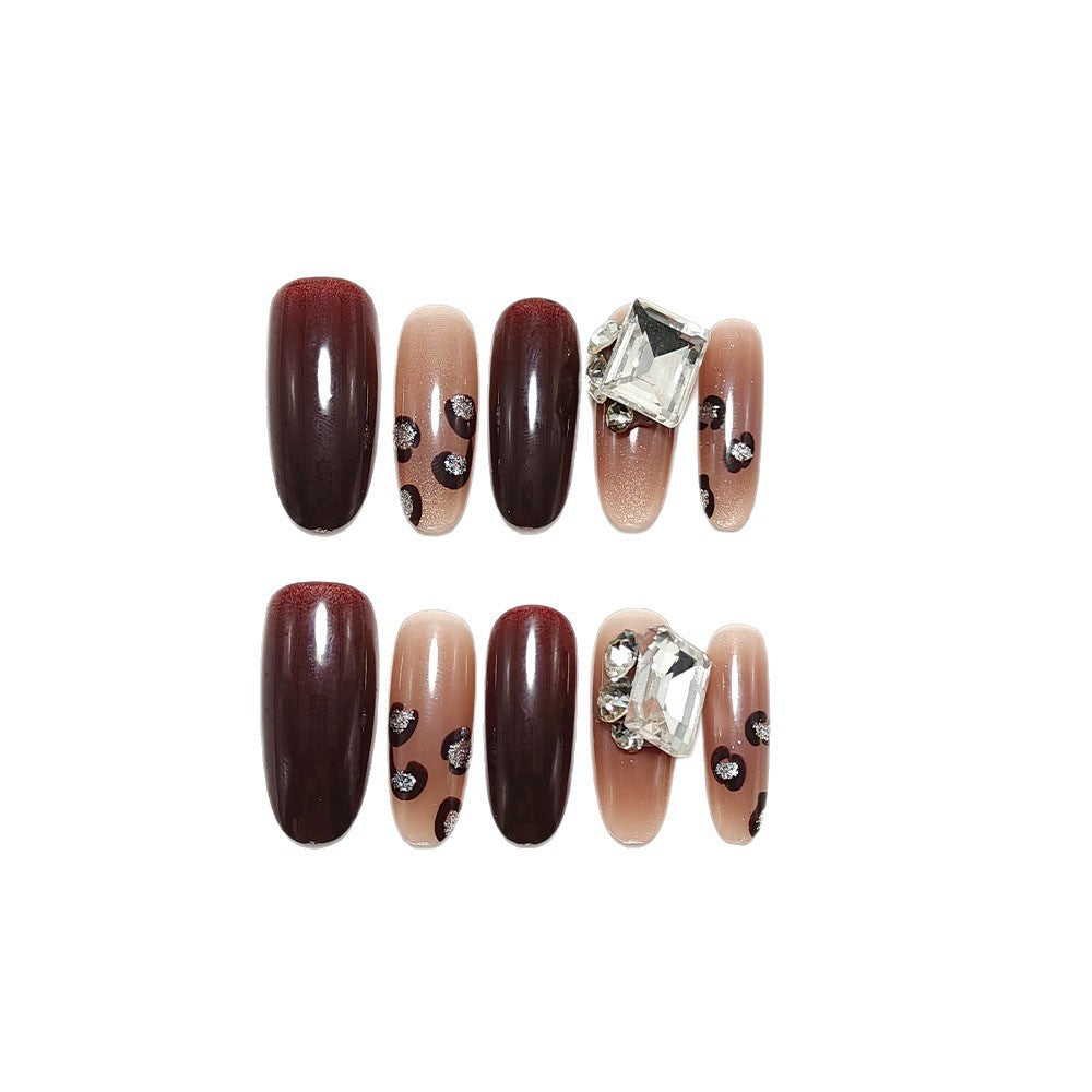 Luxury artificial nails with elegant rhinestone applications Bowlift