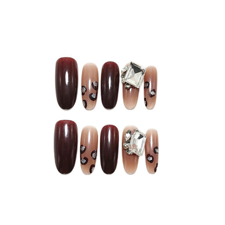 Luxury artificial nails with elegant rhinestone applications Bowlift