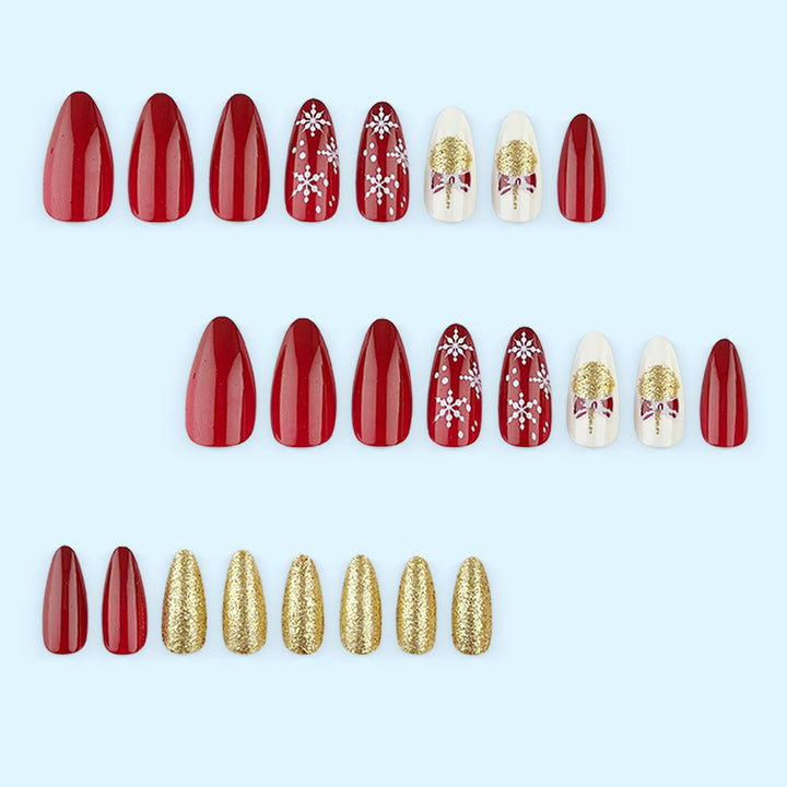 Glamorous artificial nails in festive Christmas design Bowlift