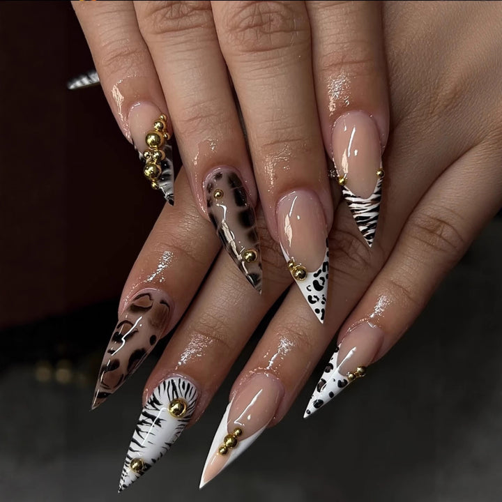 Elegant animal pattern artificial nails with 3D applications Bowlift