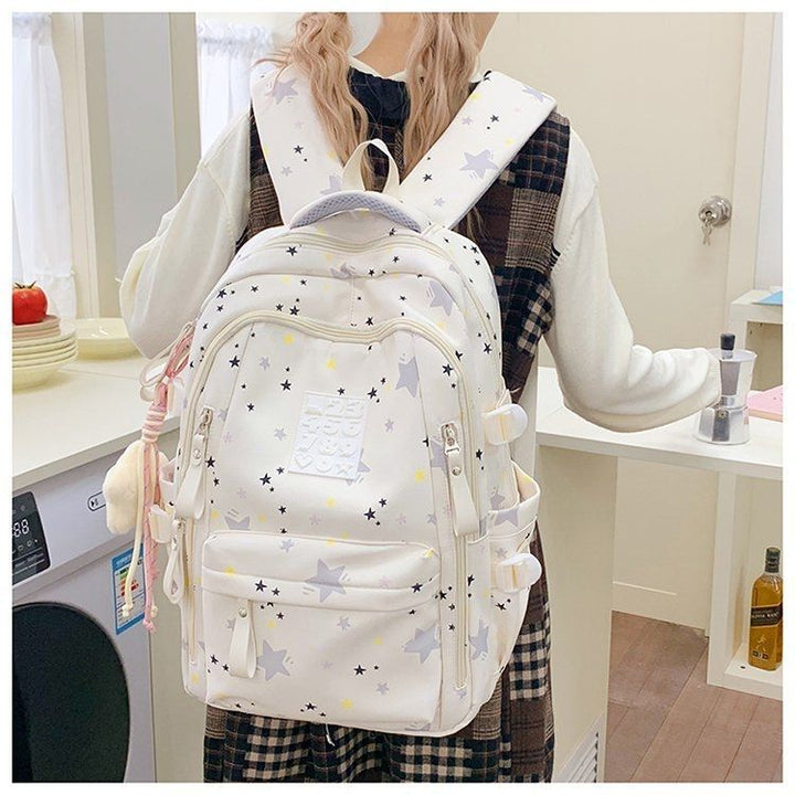 Playful backpack with star motifs and practical functions Bowlift