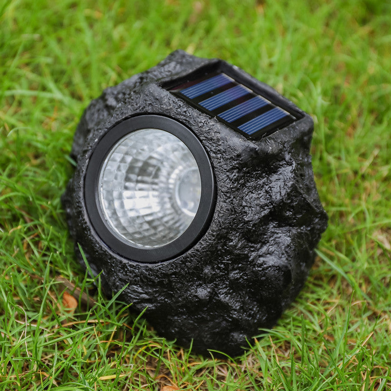 Solar powered faux stone garden spotlight with high efficiency LED array Bowlift