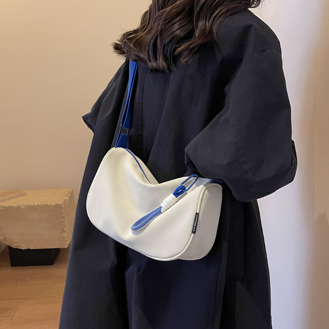 Fashionable shoulder bag with adjustable carrying strap Bowlift