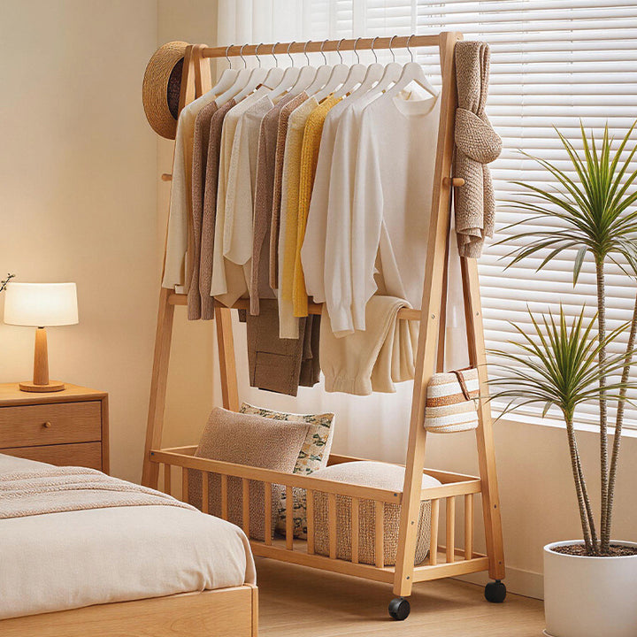 Designer laundry rack with foldable frame and practical shelf Bowlift