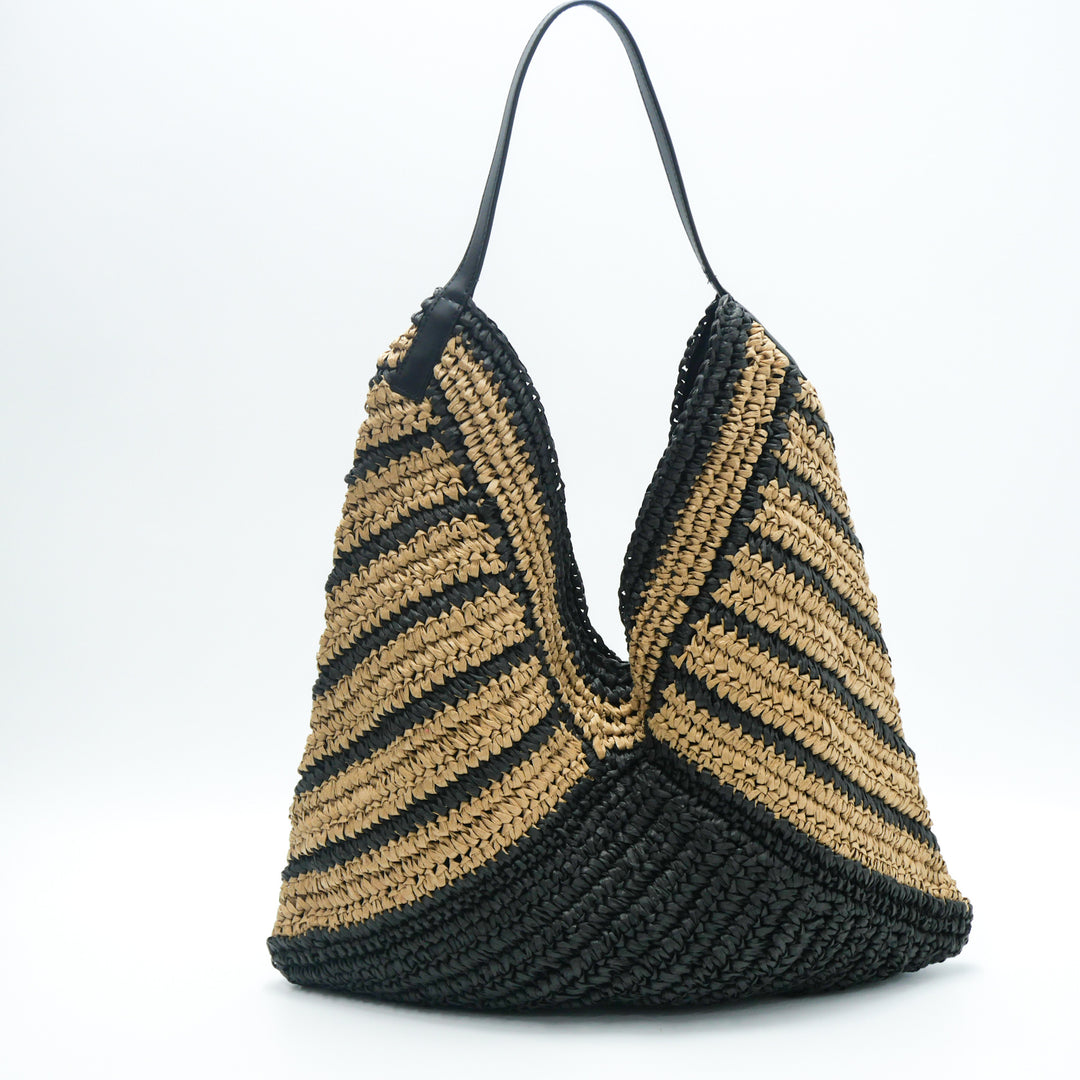 Leisure bag made of braided natural material Bowlift