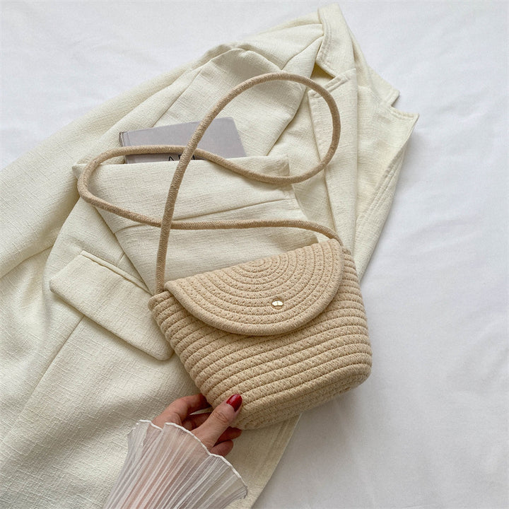 Hand-knotted mini bag with curved design Bowlift