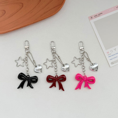 Playful Bow and Star Keychain Bowlift