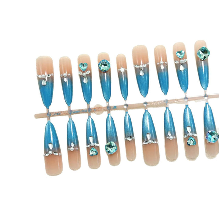 Artificial nails with elegant glitter and stone details Bowlift