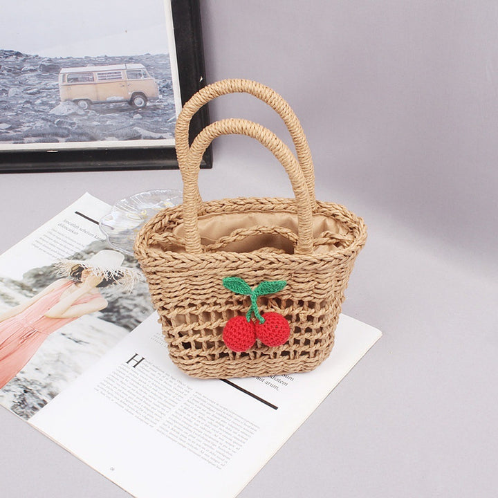 Basket bag with hand-knotted appliqués Bowlift