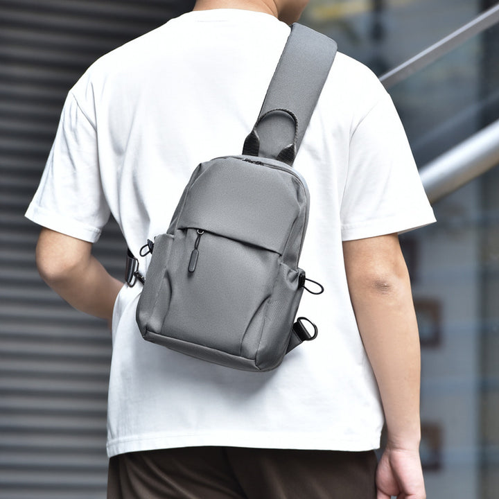 Sling backpack with multiple compartments and ergonomic design Bowlift