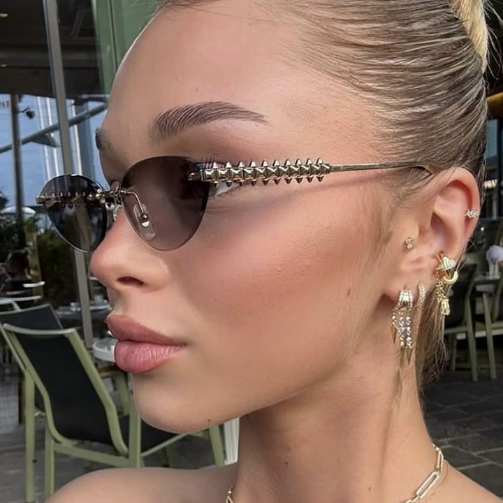Women's sunglasses in modern, geometric design with stylish metal frame and UV protection Bowlift