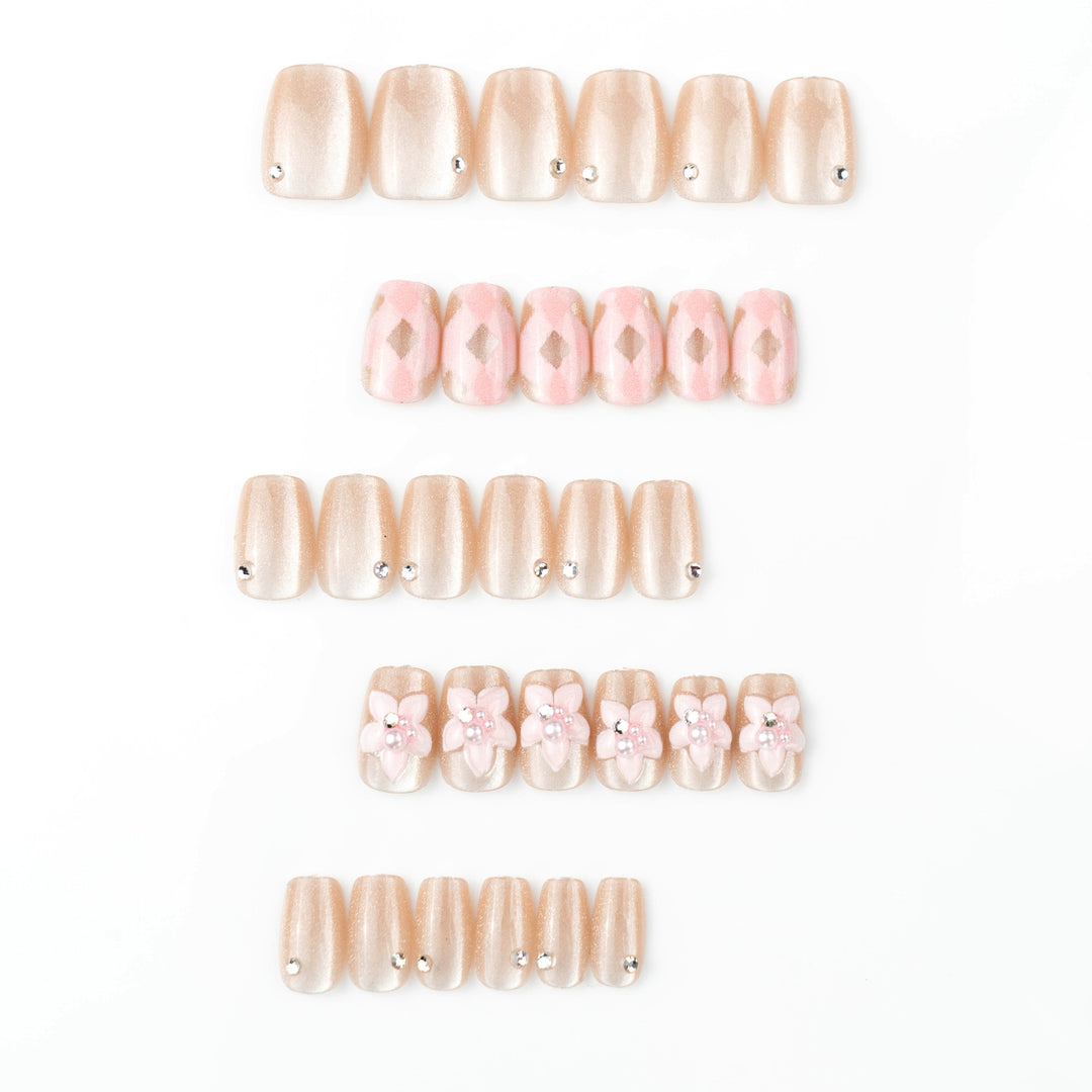 Artificial nail set with floral accents and glitter Bowlift
