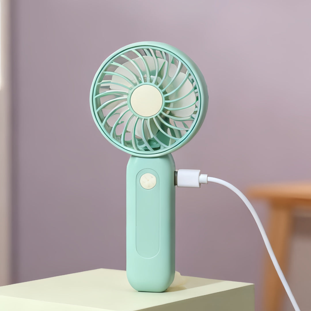 Women's portable battery-operated hand fan with ergonomic design and USB charging Bowlift