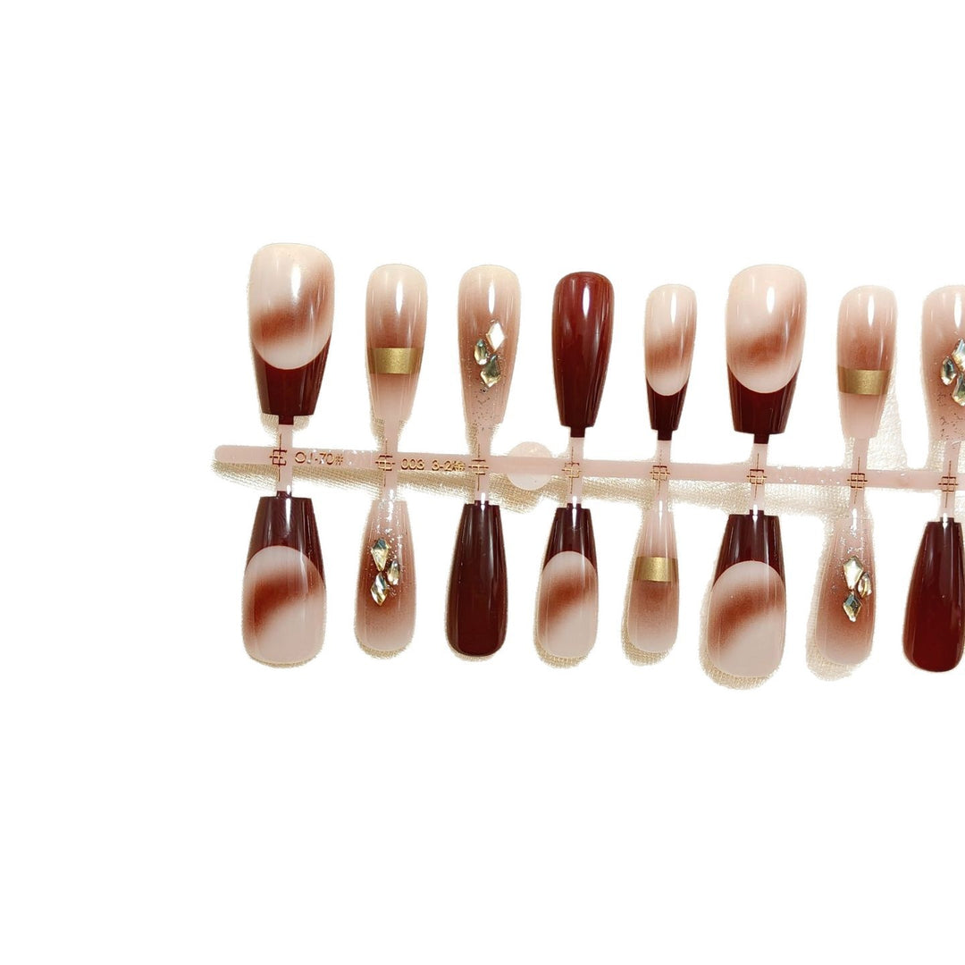 Artificial nails with elegant color gradients and jewelry details Bowlift