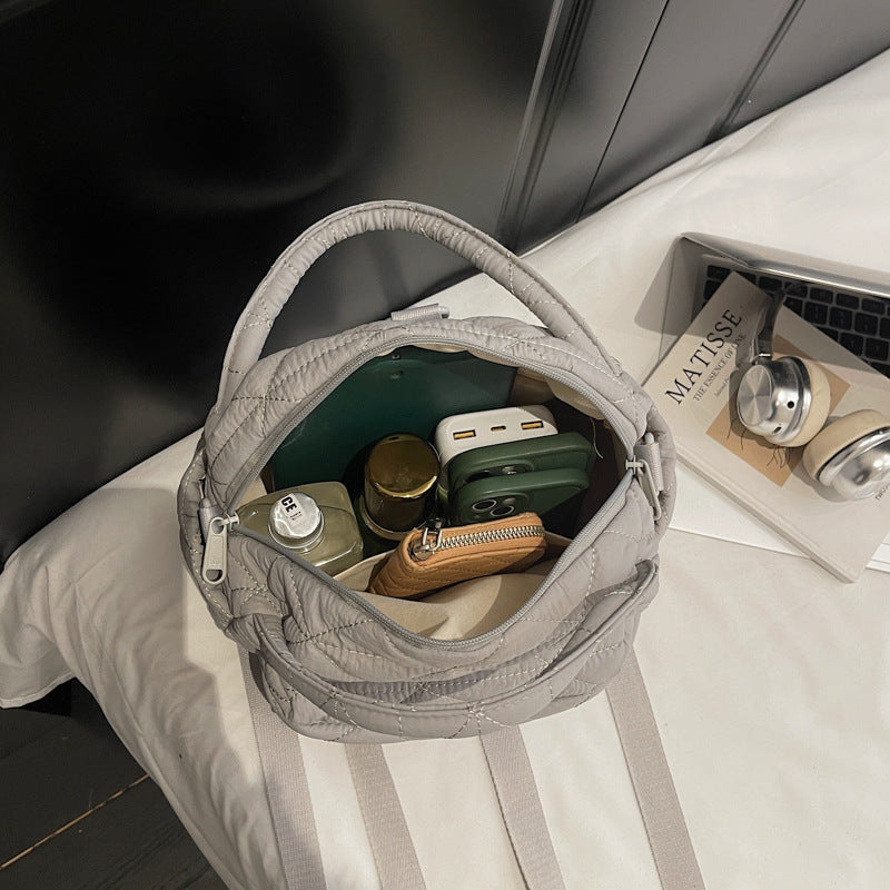 Shoulder bag with padded inner compartments Bowlift