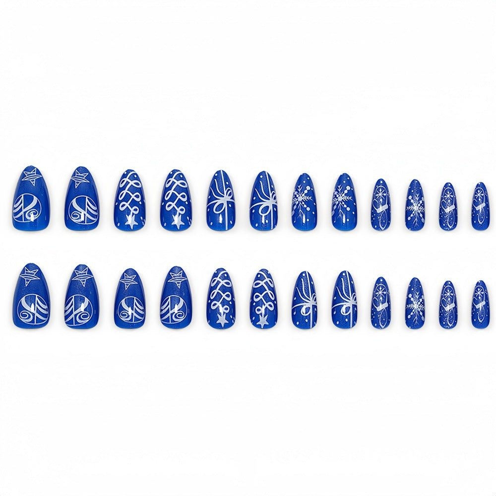 Artificial nails in festive winter design with glittering snowflakes and elegant decorations Bowlift