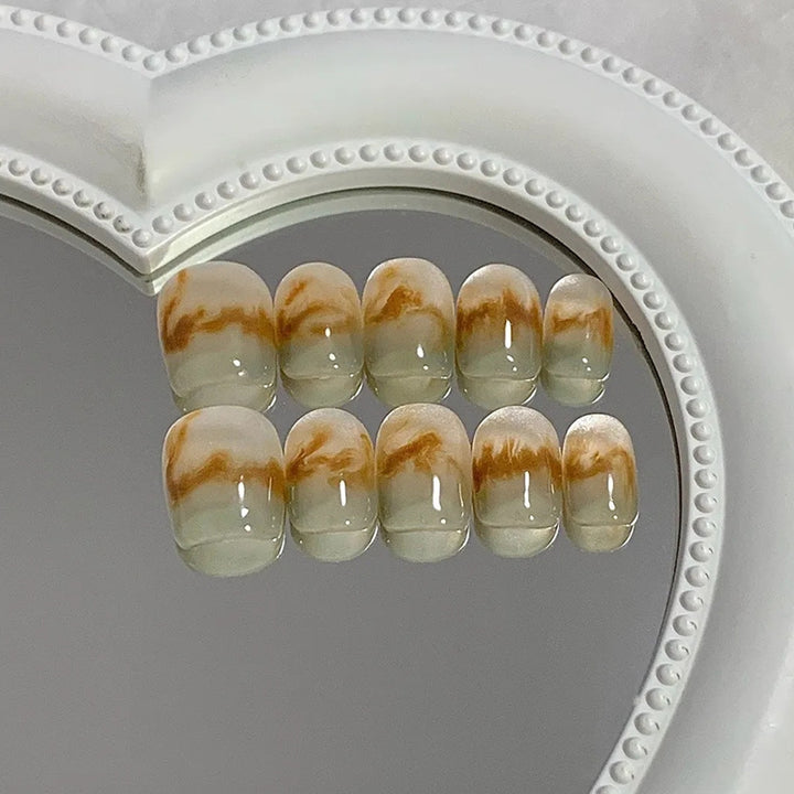 Artificial nails in modern marble design Bowlift