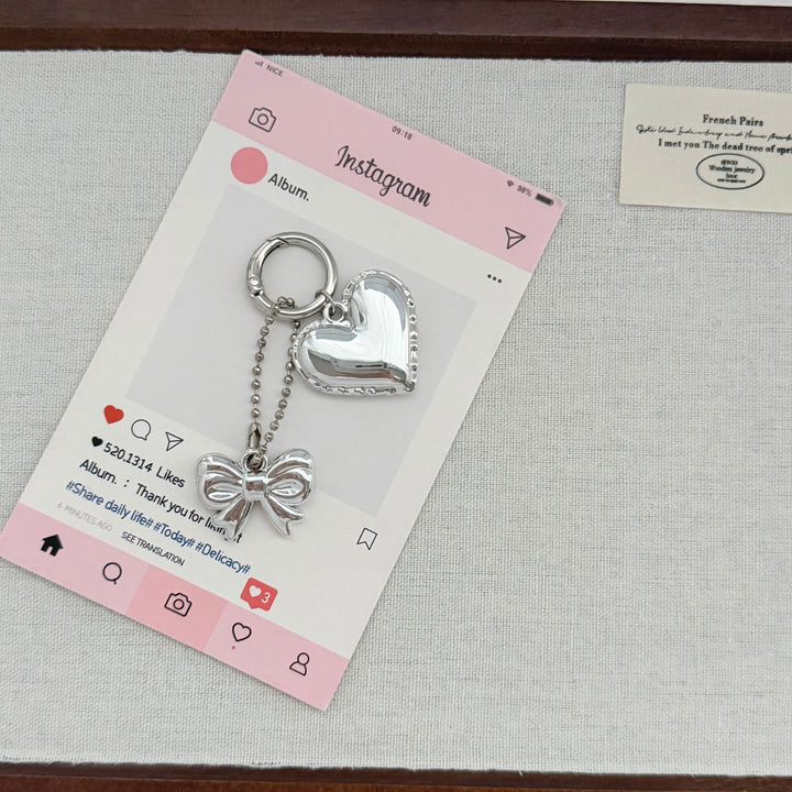 Heart-Shaped Charm Keychain with Bow Bowlift