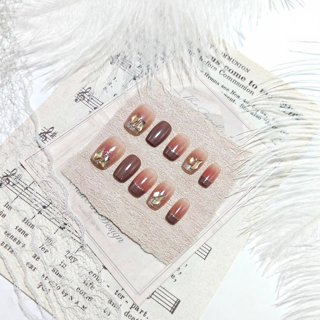 Acrylic nails in elegant ombre design with glitter elements Bowlift