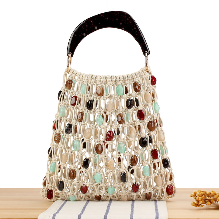 Fashionable handbag in creative net design with colorful accents Bowlift