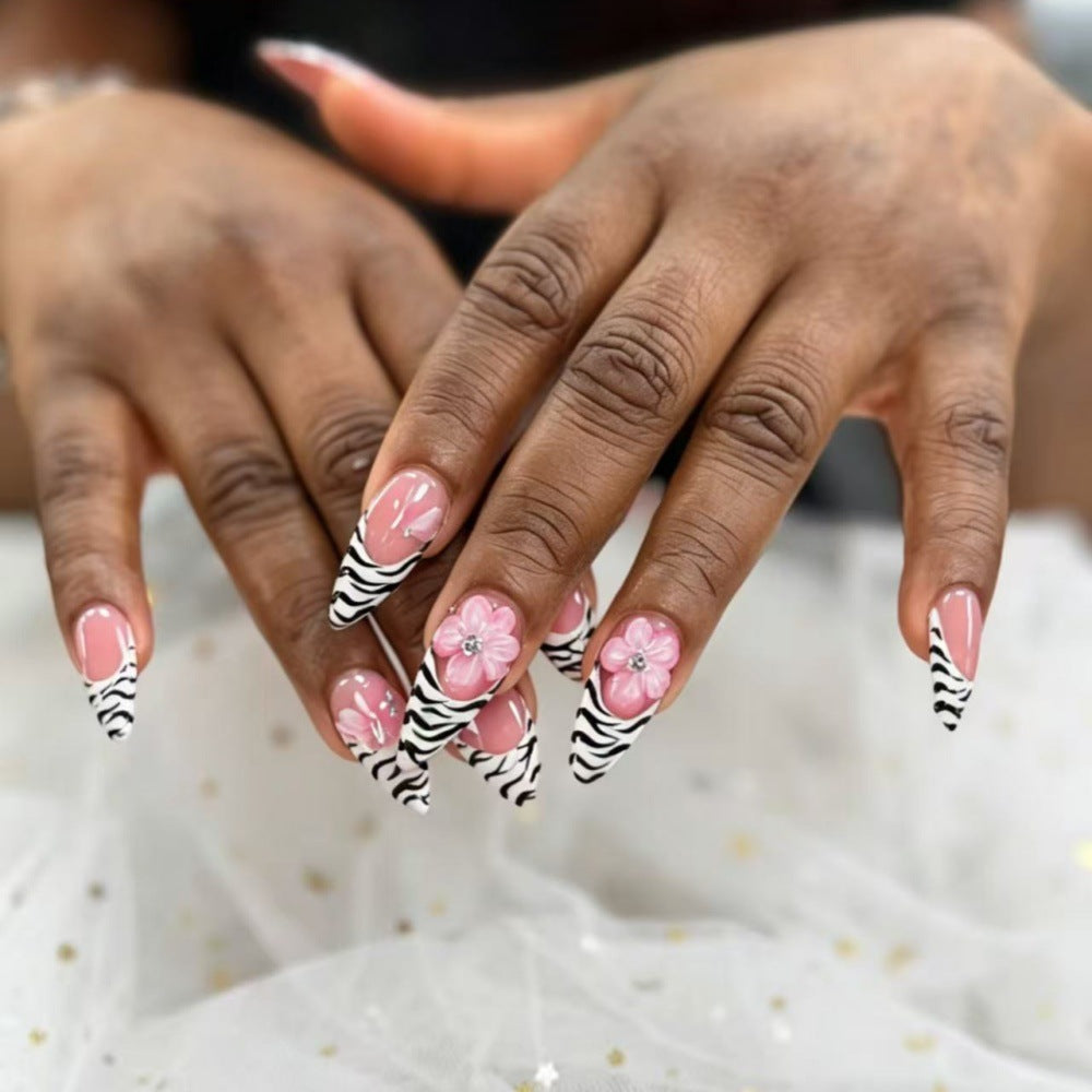 Artificial nails with flower and zebra stripe pattern Bowlift