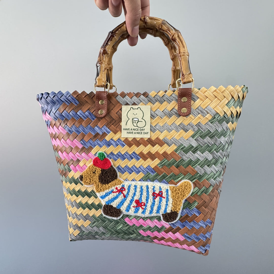 Playful Bast Handbag Bowlift