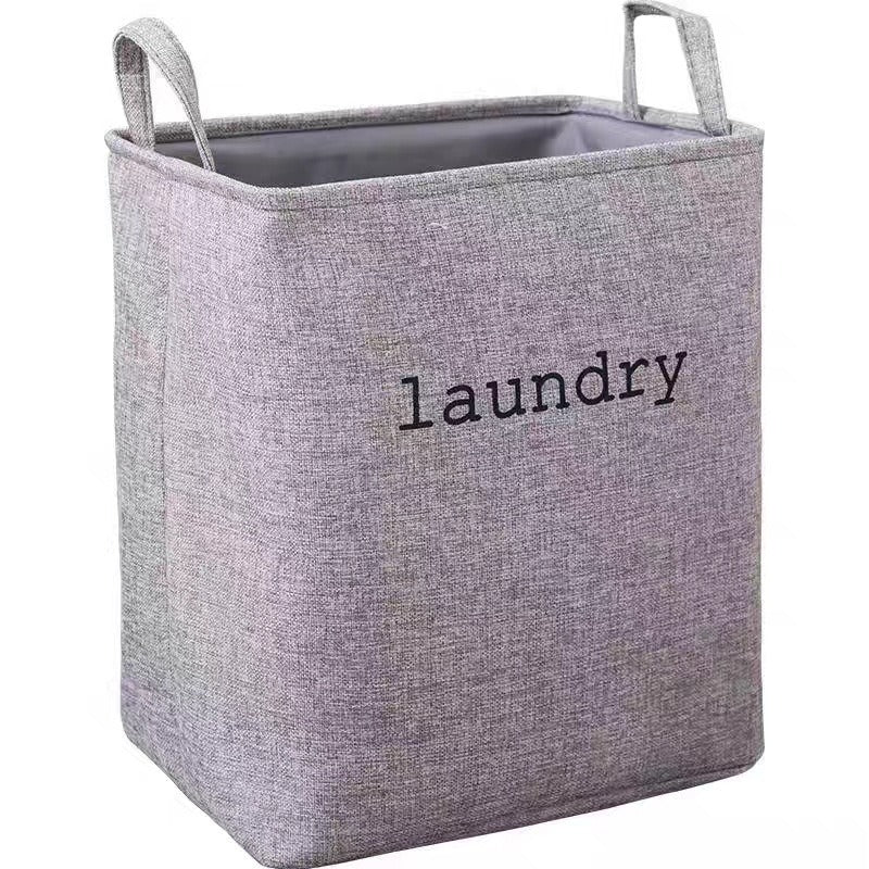 Laundry basket with practical carrying handle and modern design Bowlift