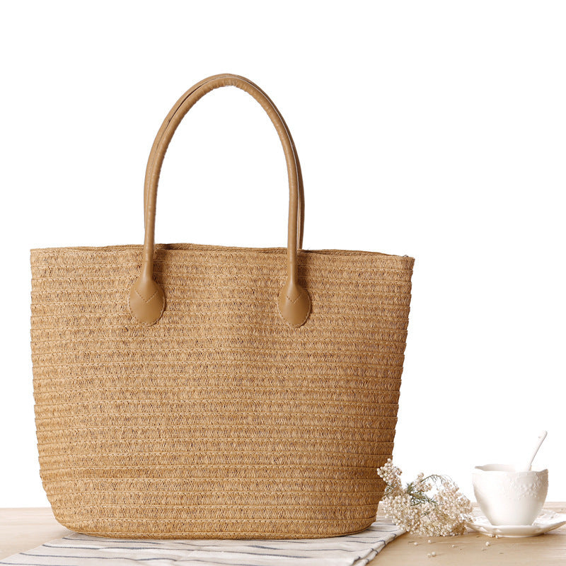 Spacious straw tote bag with elegant leather straps Bowlift