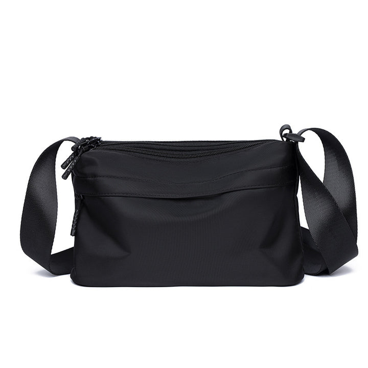 Practical shoulder bag with multiple compartments Bowlift