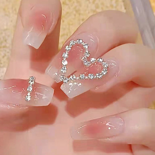 Artificial nails with romantic heart decorations Bowlift
