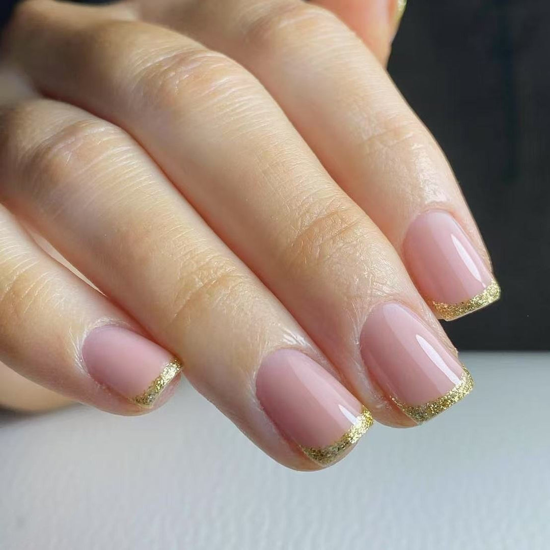 Artificial nails in elegant French tip design Bowlift
