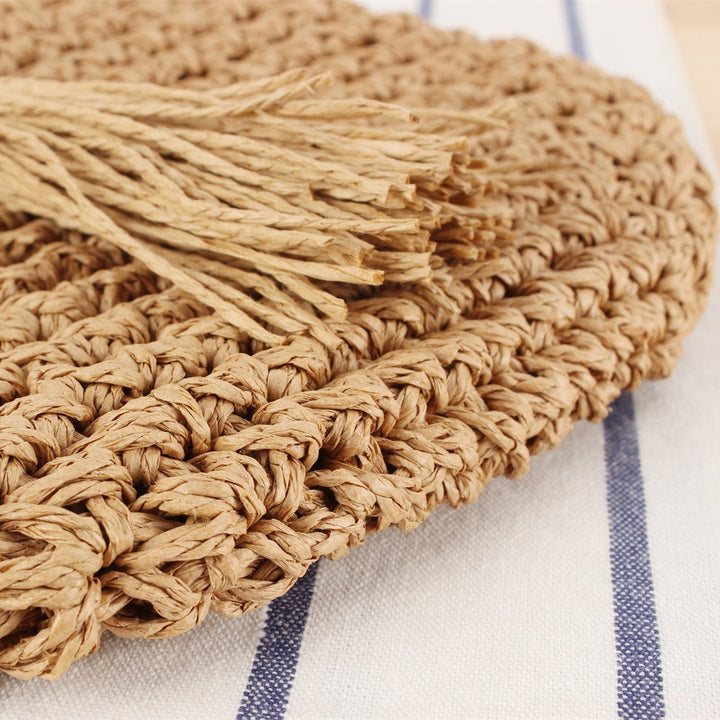Braided shoulder bag with tassels and wooden decorations Bowlift