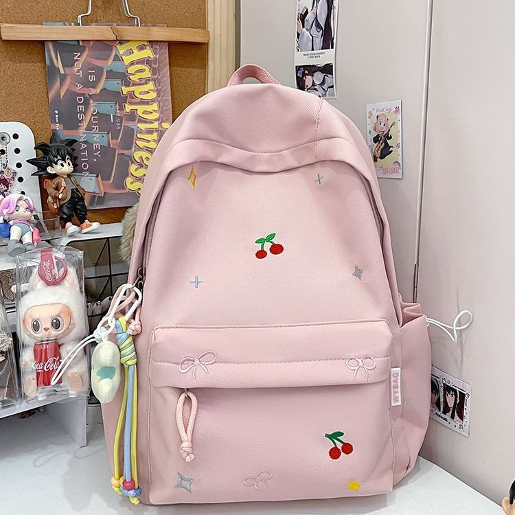 Playful backpack with embroidery Bowlift