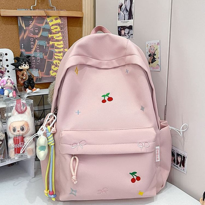 Playful backpack with embroidery Bowlift