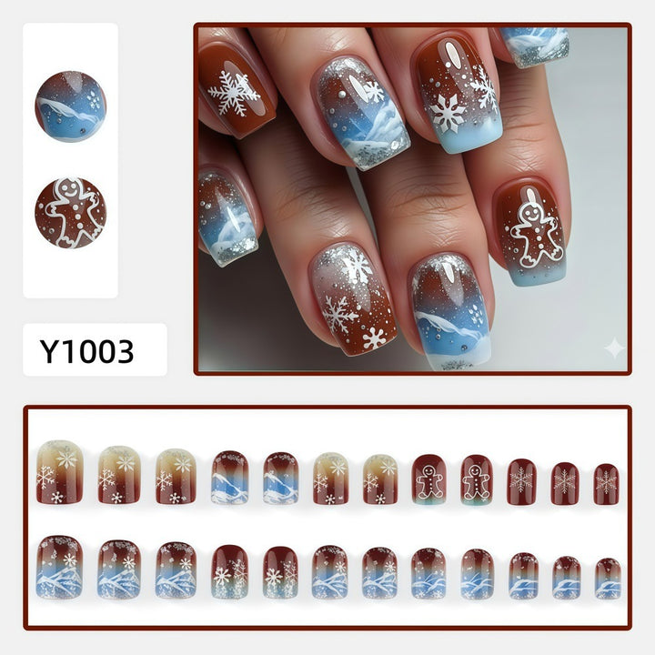 Artificial nails with festive snowflake and gingerbread motif Bowlift