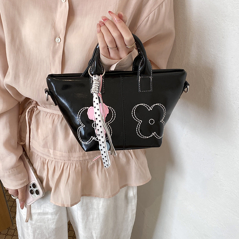 Fashion-Forward Handbag Bowlift