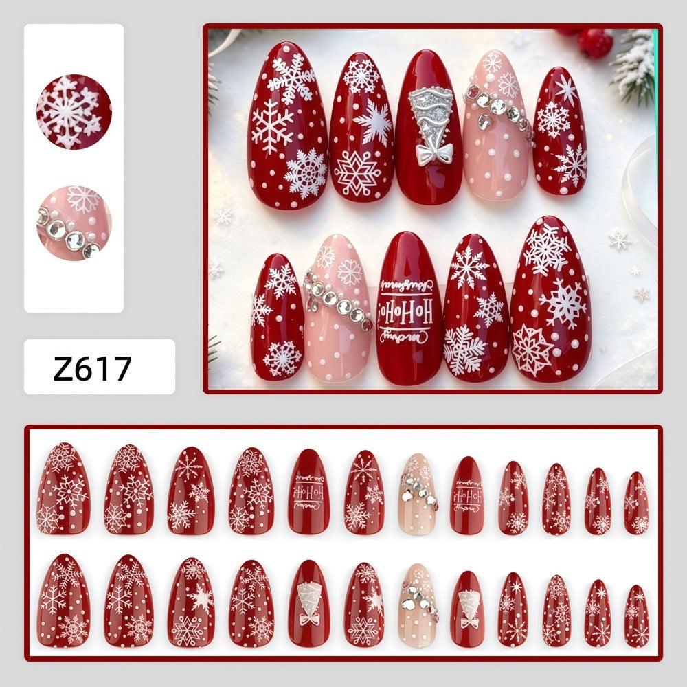 Artificial nails in festive Christmas design Bowlift
