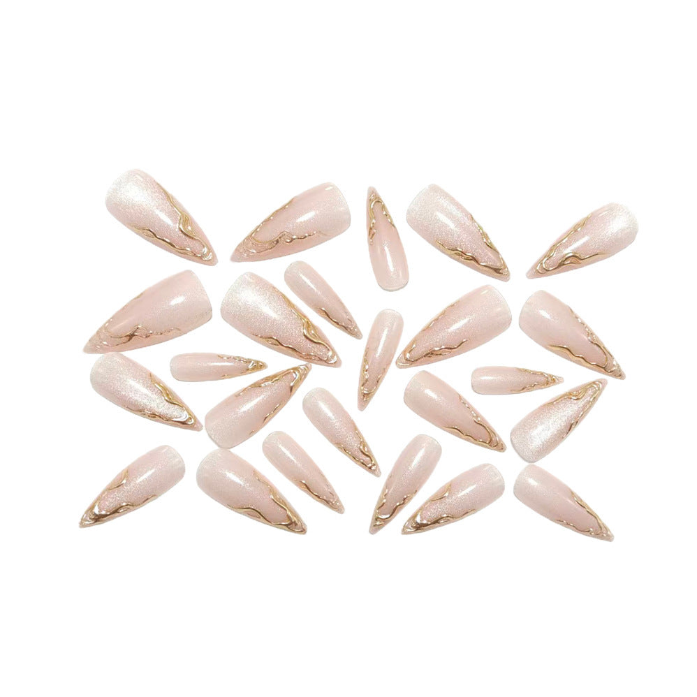 Artificial nails in an elegant style with gold accents Bowlift