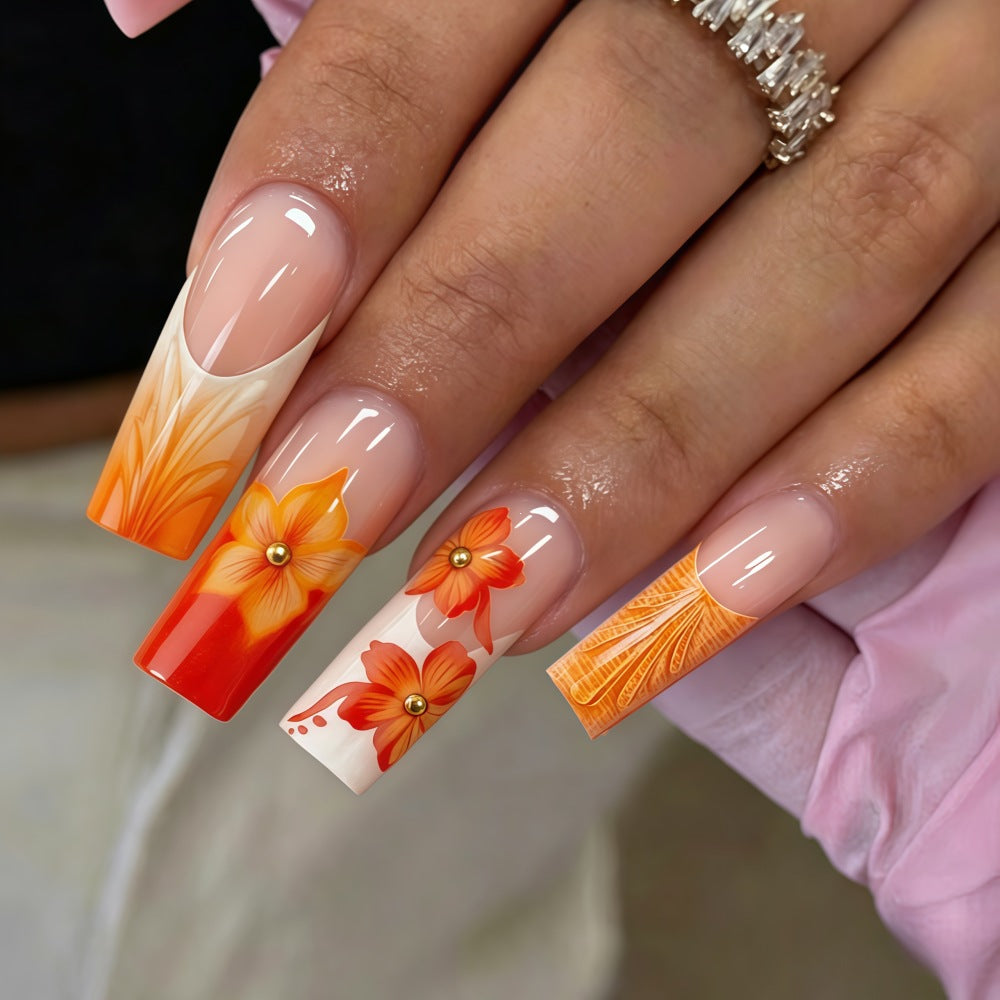 Nail art with floral accents and glitter Bowlift