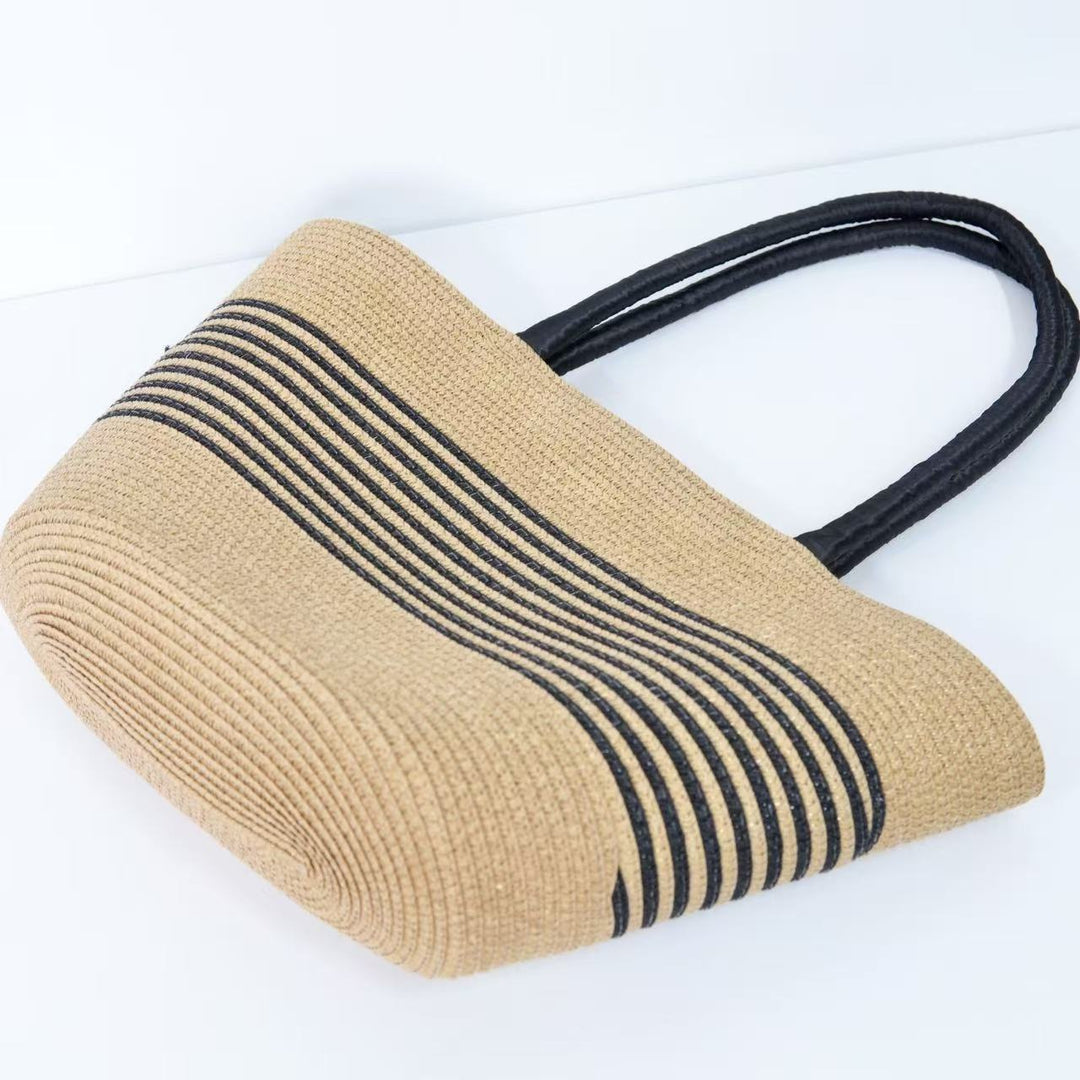 Beach bag with elegant stripe pattern and sturdy shoulder straps Bowlift