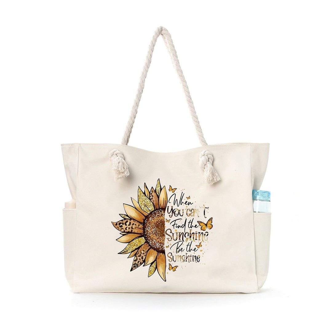 Beach bag with practical side pockets and robust design Bowlift