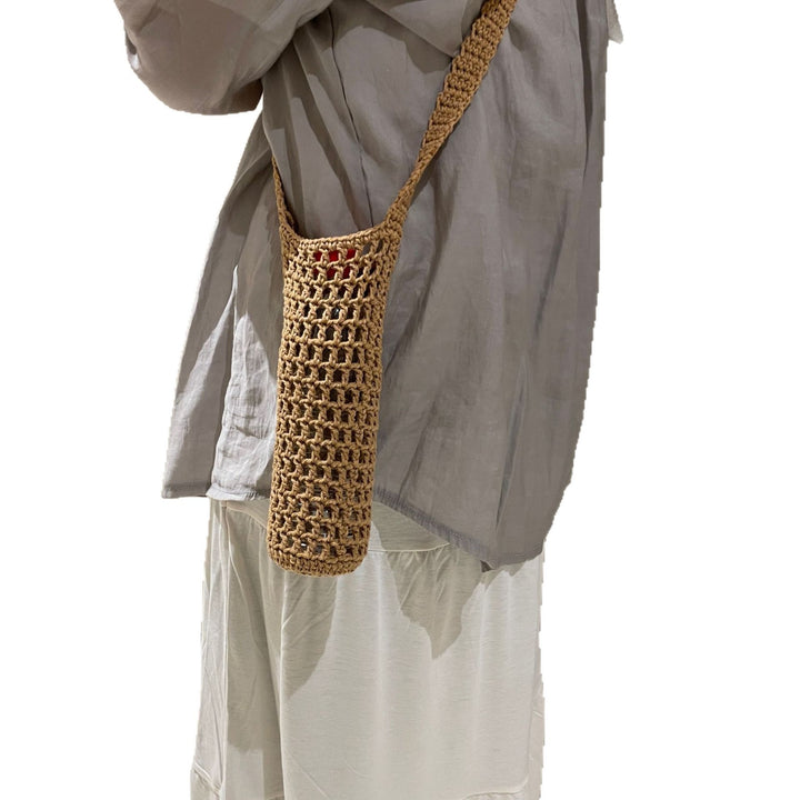 Hand-knotted bottle carrier Bowlift